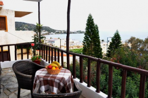 Отель Heliotrope Apartments  Сталис